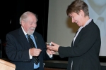 M.W. Bro. Daniels presenting an engraved Quaich to Dr. Harland-Jacobs